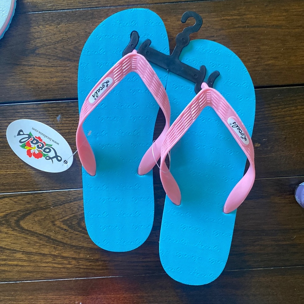 Locals Hawaiian sandals bran new!! Size 11 that means size 9/10 in shoes.